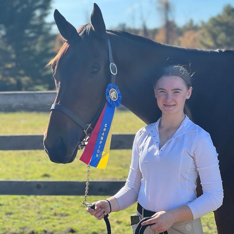 perfect timing with champions ribbon at horse show